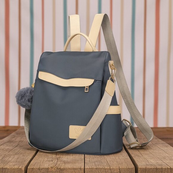 ποΈChic & Versatile Travel Pom-Pom Charm Backpack β Waterproof & Stylish πβ¨ - Picture 5 of 11